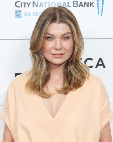 Ellen Pompeo poses in a beige top