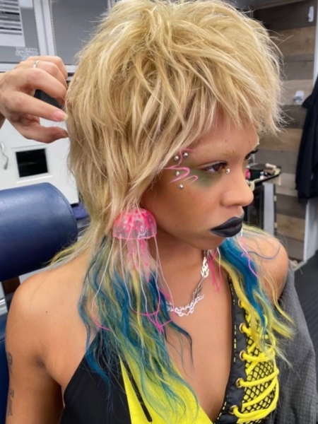 A photo of Rico Nasty in her blonde and dipdyed ends mullet for her role as KC in Margo's Got Money Troubles.